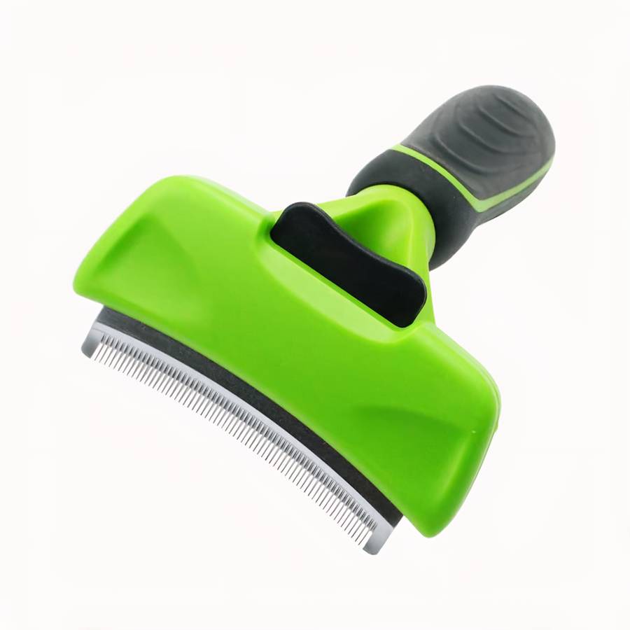 brosse de toilettage verte chat