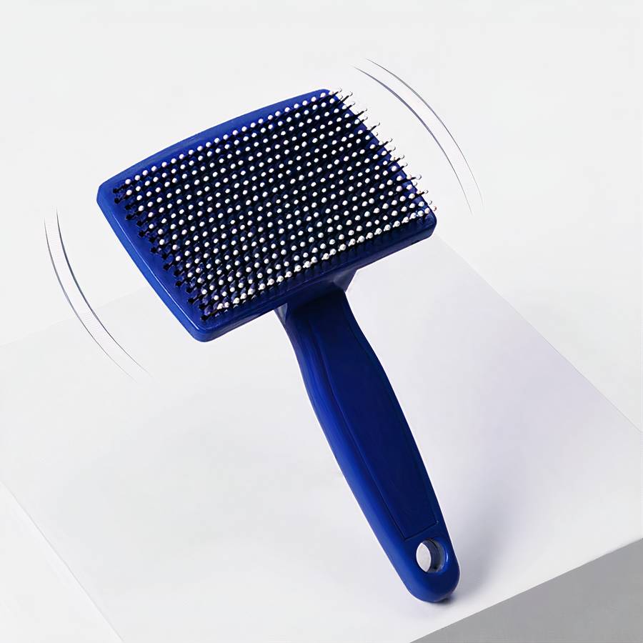 brosse chat ergonomique